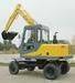 Mini wheeled excavator with a 360 degrees revolving superstrcuture