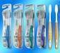 Colorful soft TPE handle adult toothbrush
