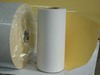 Self adhesive cast coated paper