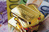 We buy 50-200mt of  gold bullion in bars form  in Europe/U.S./CANADA