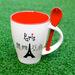Ceramic mug with spoon