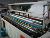 Paper rewinder with embossing and perforation