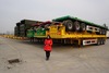 Sinotruk 3 axle 60tons flatbed container Skeleton semi trailer