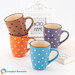 Embossed ceramic coffee mug with color glaze and white dots painted