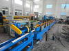 Automatic rolling shutter door forming machine